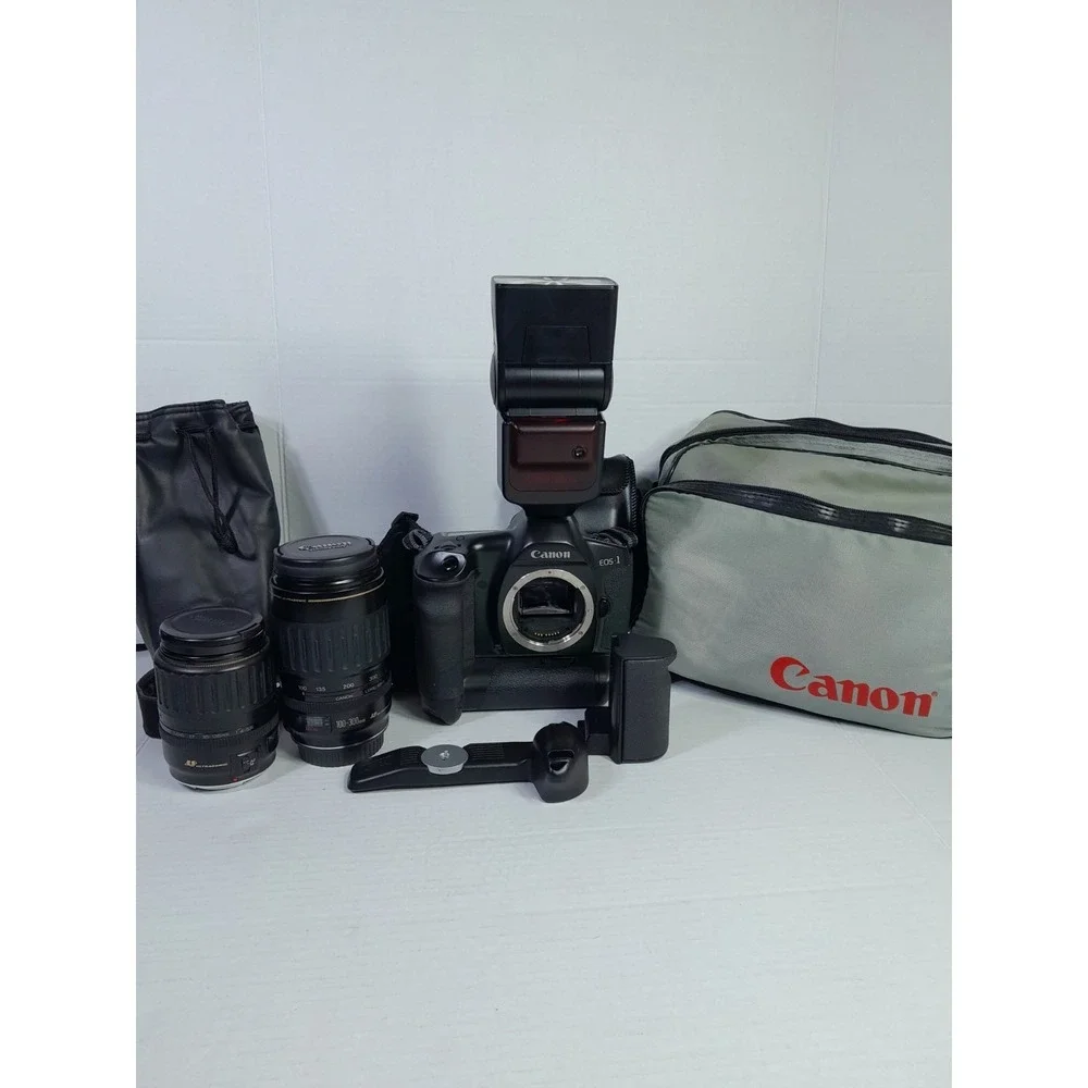 Vtg Canon EOS-1N RS 35mm SLR Film Camera W Accessories 2 Lens Grip Light Bag